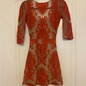 Minimally used mini dress with beautiful embroidery.